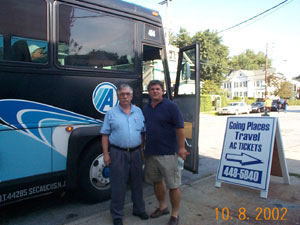 Pete and Ron outside the bus waiting for all to board