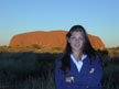 Jessica posing in front of Uluru - in the Outback of Australia